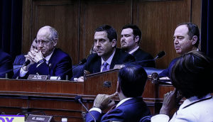 Republican leaders Devin Nunes (R-Ca) and Mike Conaway (R-tx) avoid eye contact with Adam Schiff (D-Ca) during his speech dubbed "you might think it's ok, but it's not OK." Schiff charged that President Donald Trump's actions during the last presidential campaigns were Immoral, unethical, corrupt and unpatriotic. The speech has gone viral.
