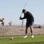 Kyle Lester swings at the ball in the 10th tee.