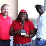 Tony Sherwood and Douter Kasago, award Faith Ogoro the Ladies Champ trophy