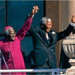 Desmond Tutu introduces newly elected SA President Nelson Mandela
