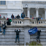 Trump supporters scale the Capitol complex wall in Washington DC
