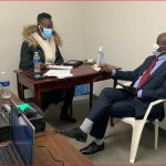 Mr. James Omosa, Charge d'Affaires at the Kenya Consulate in Los Angeles Transfering his polling Centre from Kenya to Los Angeles.