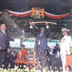 President William Ruto displays the sword, and symbol of the transfer of power in Kenya during his inauguration