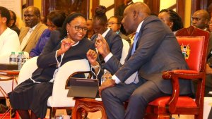 President William Ruto and Lady Chief Justice Martha Koome at the launch of The Administration of Justice Report Dec 5, 2022. IEBC Chairman Wafula Chebukati in the background. The appearance of their closeness is raising eyebrows within the opposition. |
