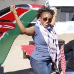 Smiling face lady with Kenya Flag