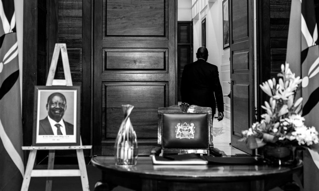 President William Ruto leaves his State House office, where a portrait of the late former Prime Minister Raila Odinga stands in silent tribute. (Photo: PPU–Kenya)