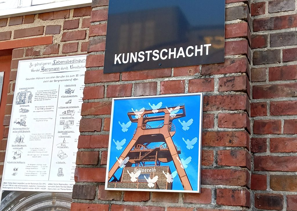 A vintage recruitment poster at Zollverein advertises retraining into mining, a historical mirror of the retraining programs funded today as Germany manages its coal exit. PHOTO/Steve Mokaya