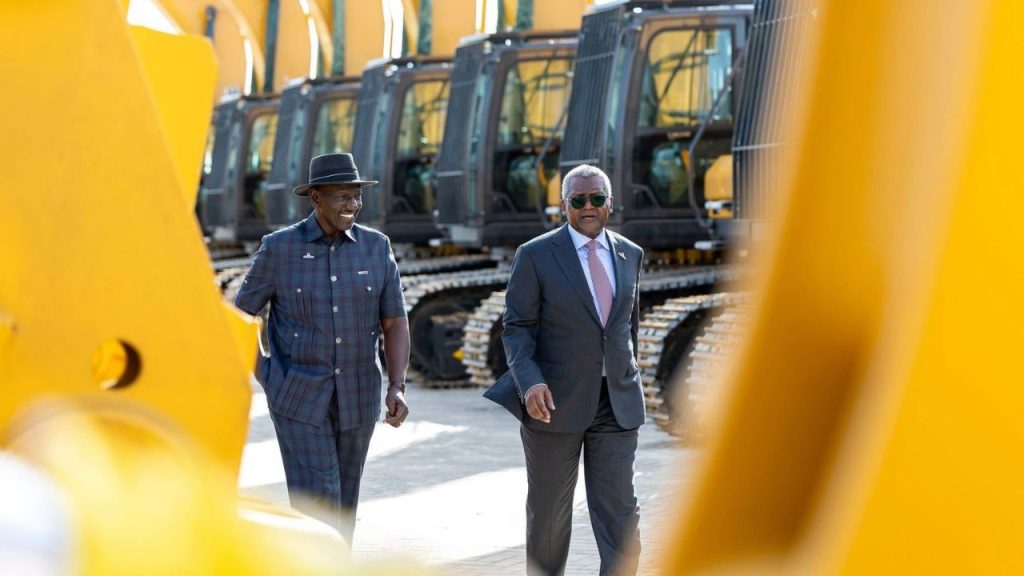 President William Ruto walks with billionaire Aliko Dangote past heavy machinery in Lamu, Kenya, ahead of the groundbreaking for Dangote's $16 billion oil refinery on Sept. 30, 2026. Dangote's investment has landed in the middle of Kenya's 2027 race, giving Ruto a flagship project to back his promises on development and jobs. |Photo: PPS